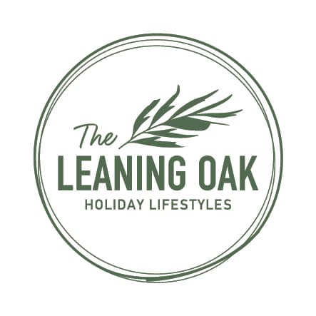 The Leaning Oak Holiday Lifestyles logo